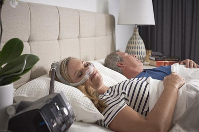 Woman sleeping wearing AirFit™ N30i mask