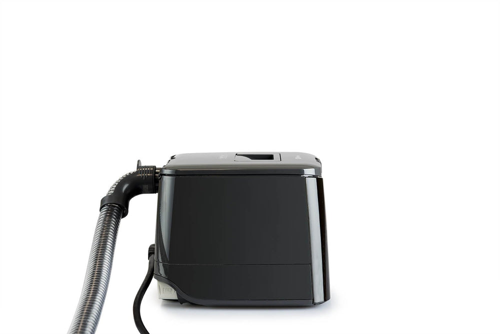SleepStyle Auto CPAP device - side view with tube and power cord attached
